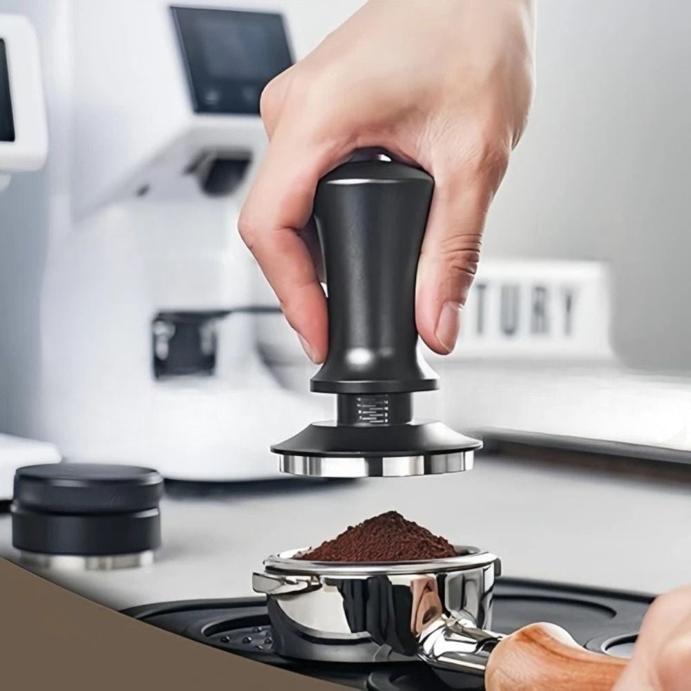 Calibrated spring espresso coffee tamper