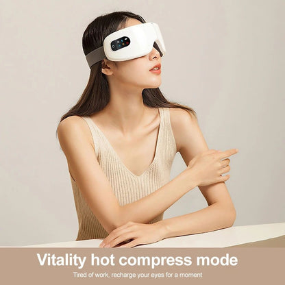 Electric heated eye massager